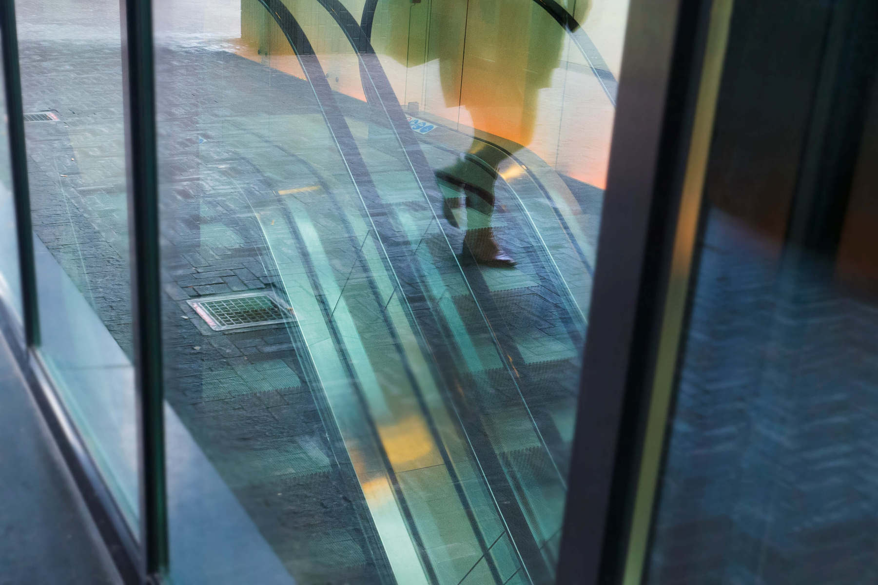 man on escalator